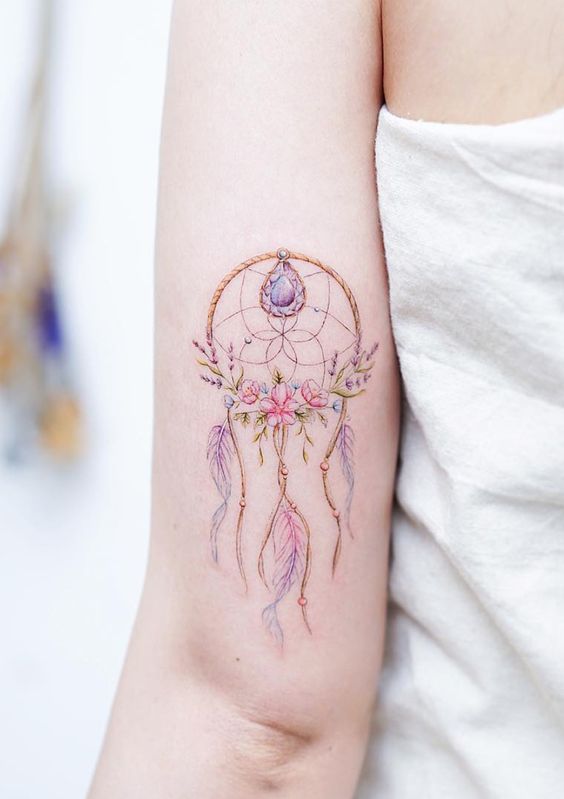 tatouage plume attrape rêves